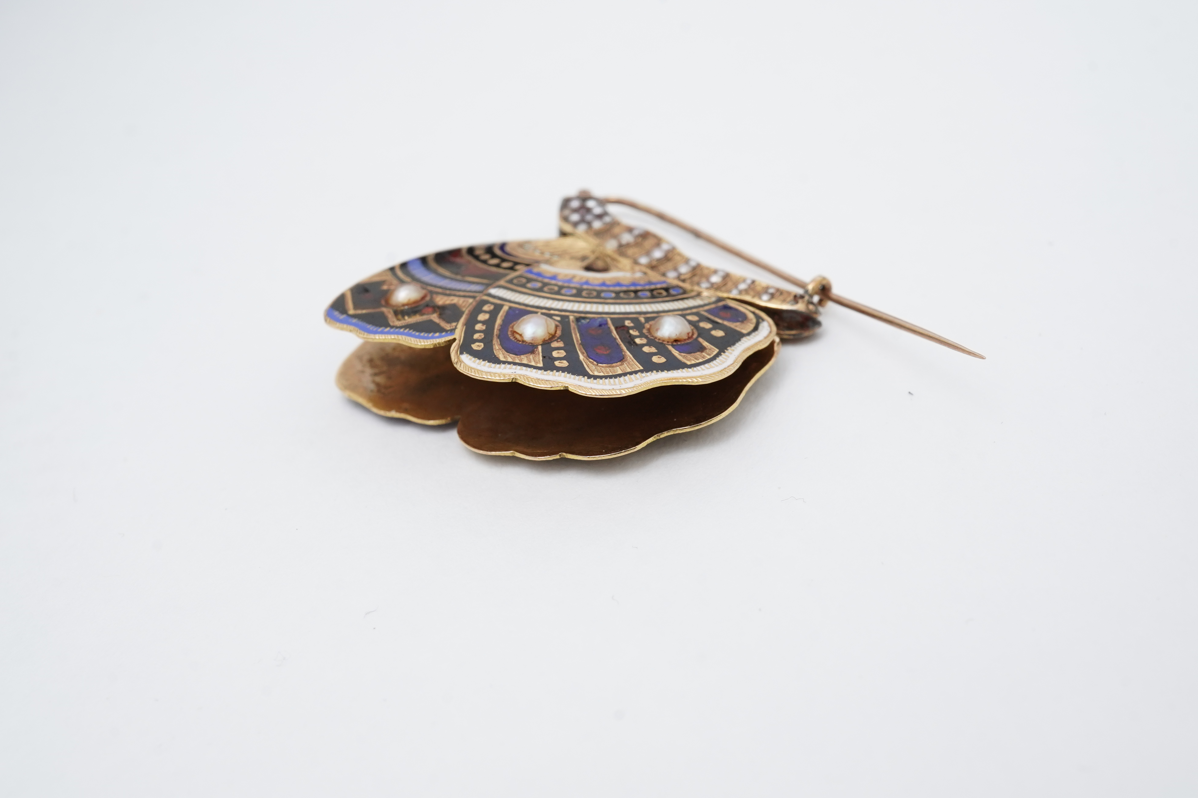 An enamel and seed pearl brooch, circa 1840